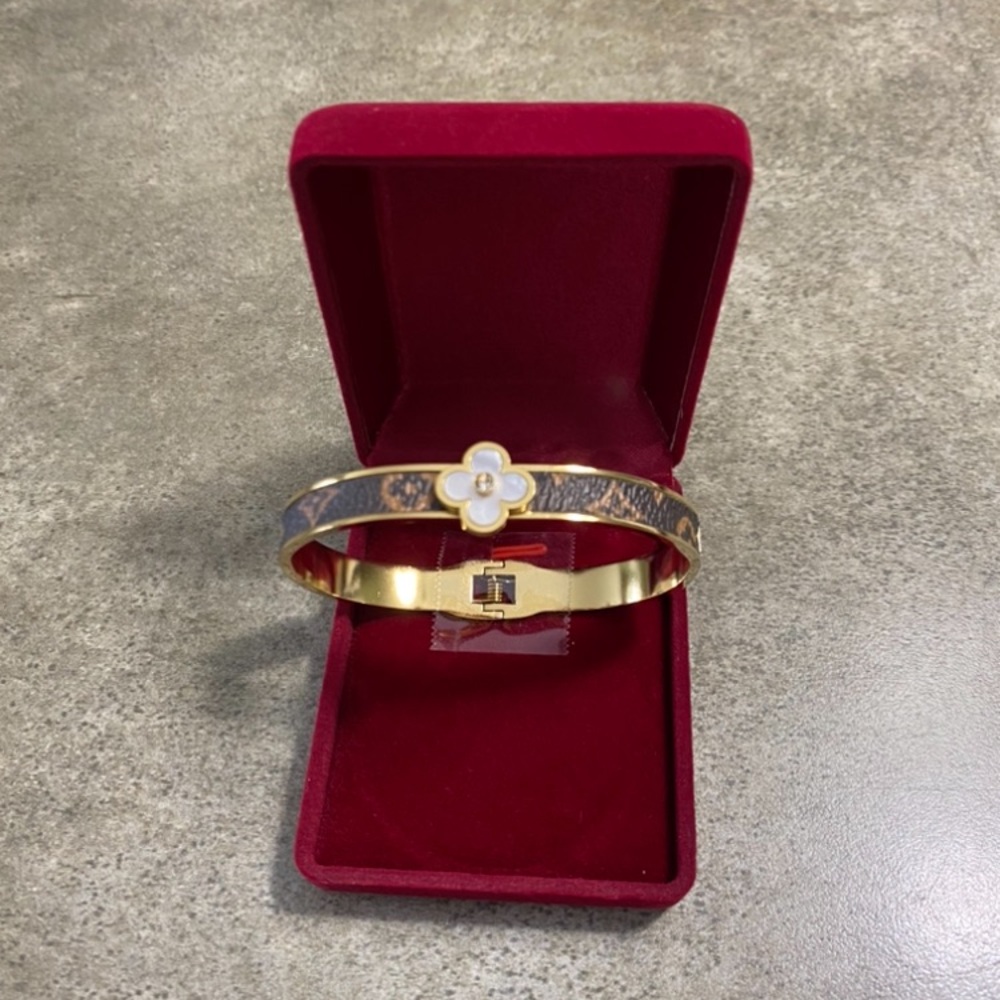 18K gold plated four leaf clover white Pearl bangle. New with box.